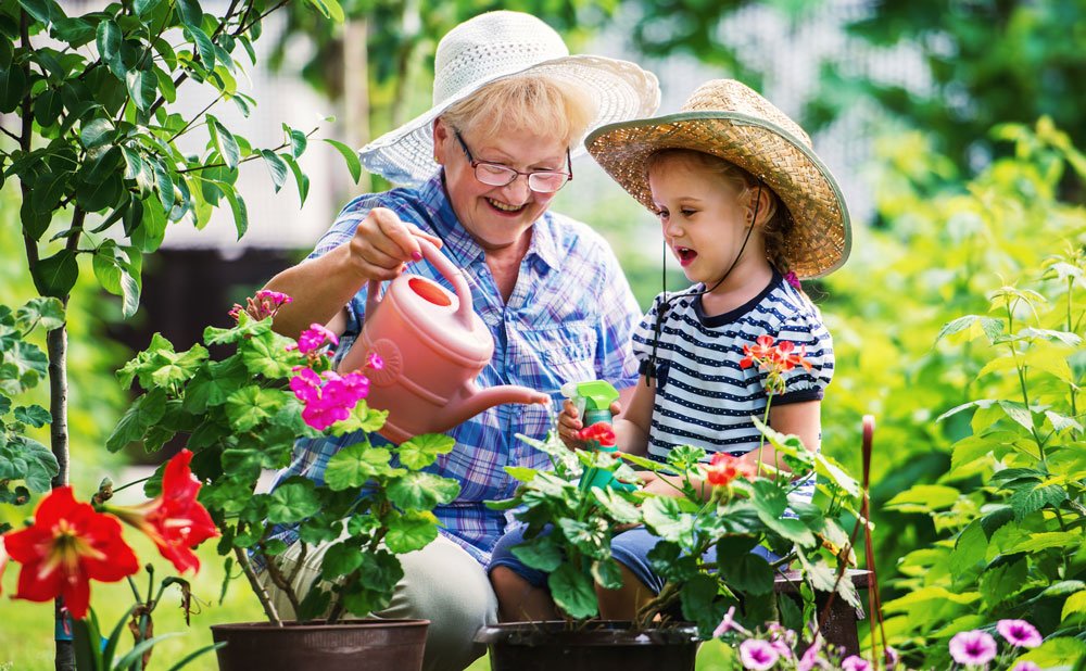 assisted living sarasota fl | Gardening with grandchild